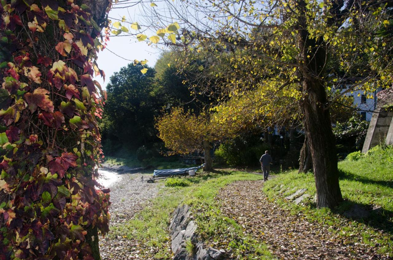 Anma Cottages The Secret Garden Pianello Del Lario Exterior photo